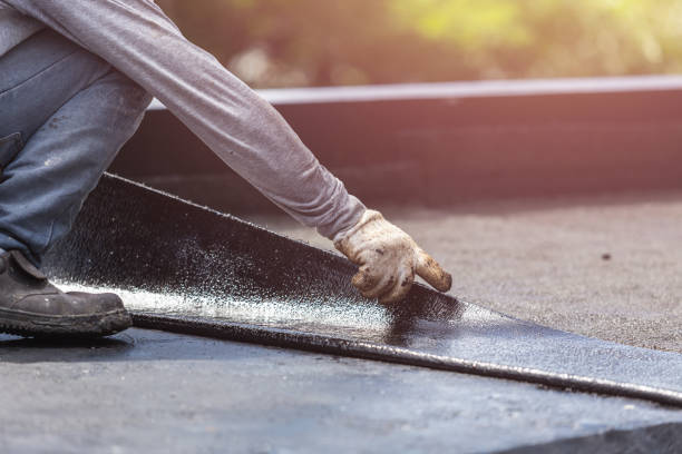 Professional Basement Waterproofing technician working in Gibbsboro, NJ